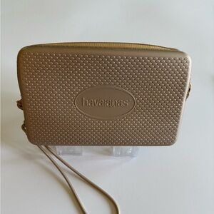 HAVAIANAS - Metallic Gold Clutch Wristlet.